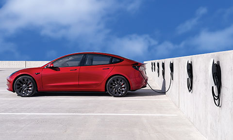 Tesla at charging station