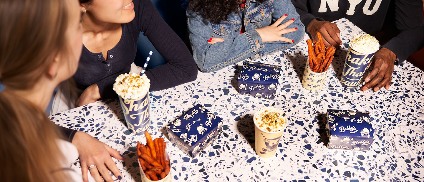 Bobby's Burgers Table of Food