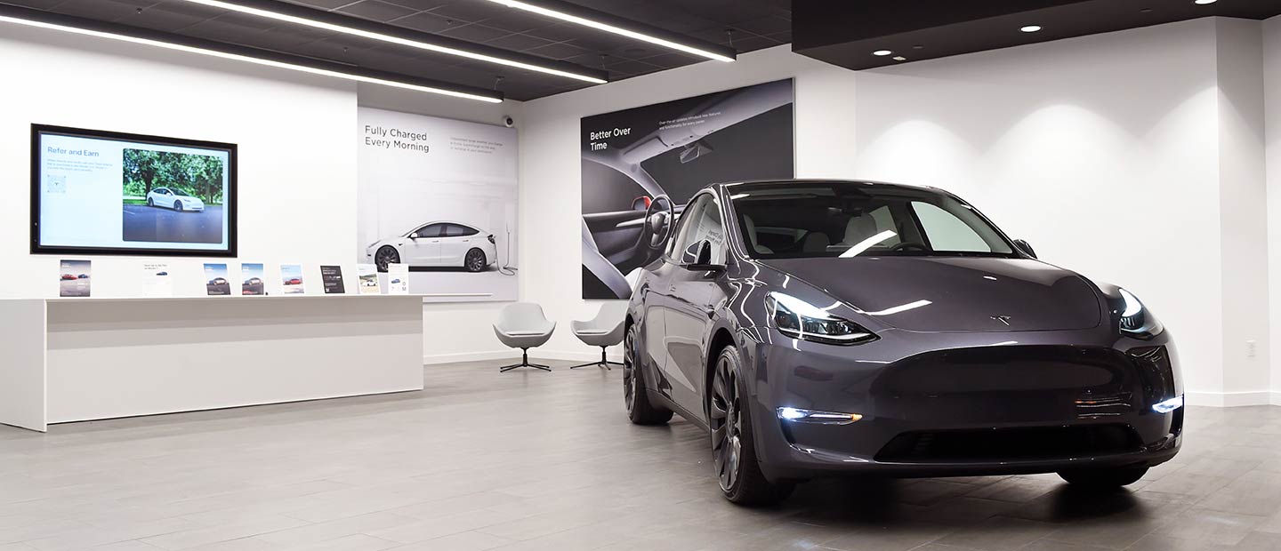 Interior of Tesla Venue Space with Tesla Car