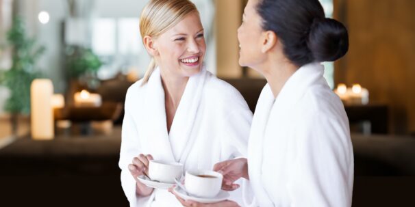 Two women at the spa smiling and laughing